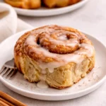 Freshly baked Banana Bread Cinnamon Rolls with white icing