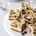 A stack of delicious Chocolate Chip Cheesecake Bars on a plate