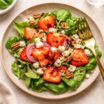 Easy Strawberry Salad with Vinaigrette Dressing in a wooden bowl
