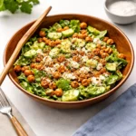 High protein salads with quinoa and chickpeas in a wooden bowl