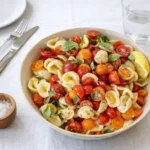 A bowl of fresh Orecchiette Bruschetta Pasta with tomatoes and basil