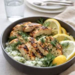 A vibrant Mediterranean-Inspired Lemon-Dill Chicken Bowl with quinoa and feta.